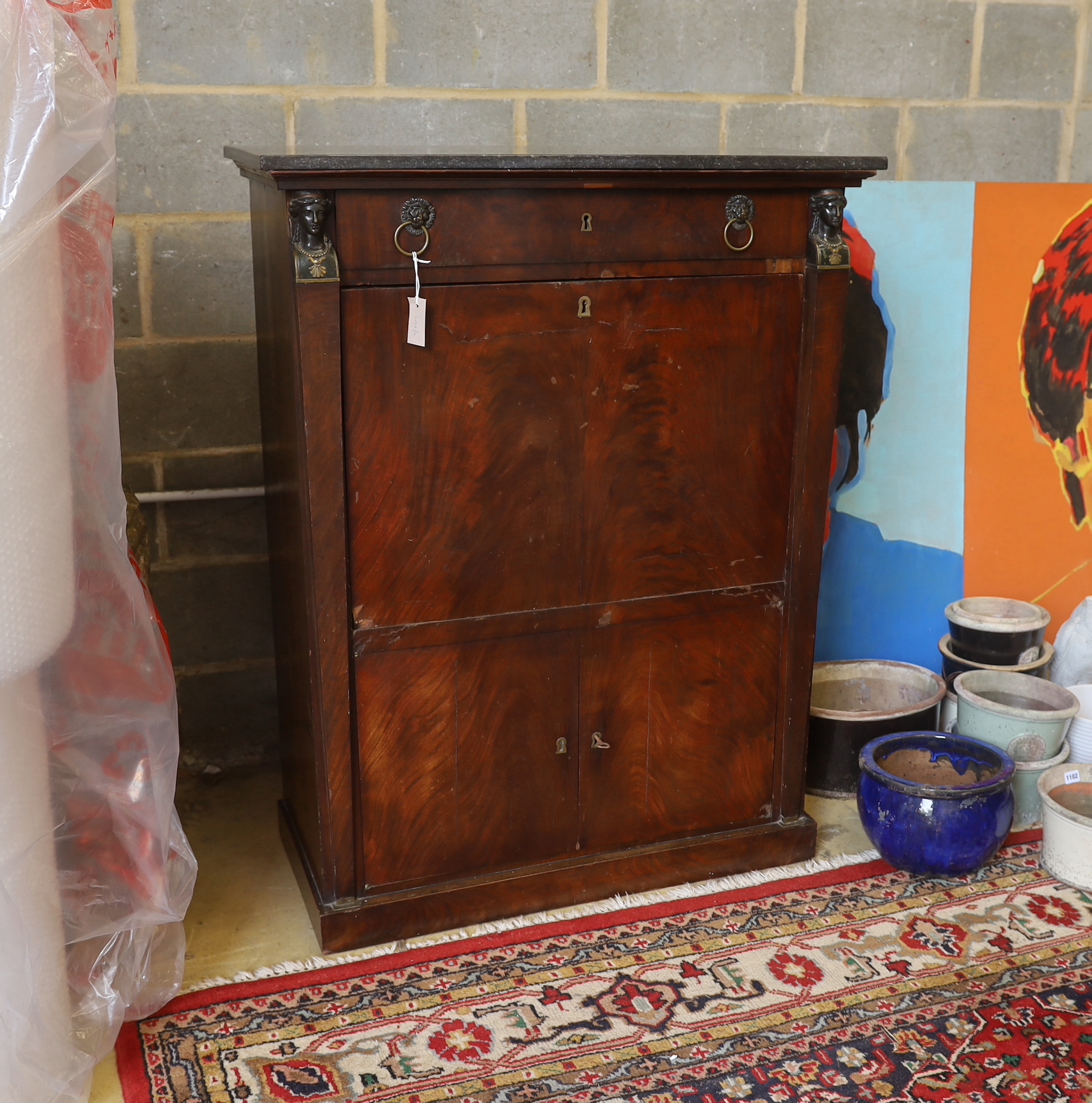 A 19th century French Empire marbled top secretaire à abbatant, width 96cm, depth 45cm, height 142cm